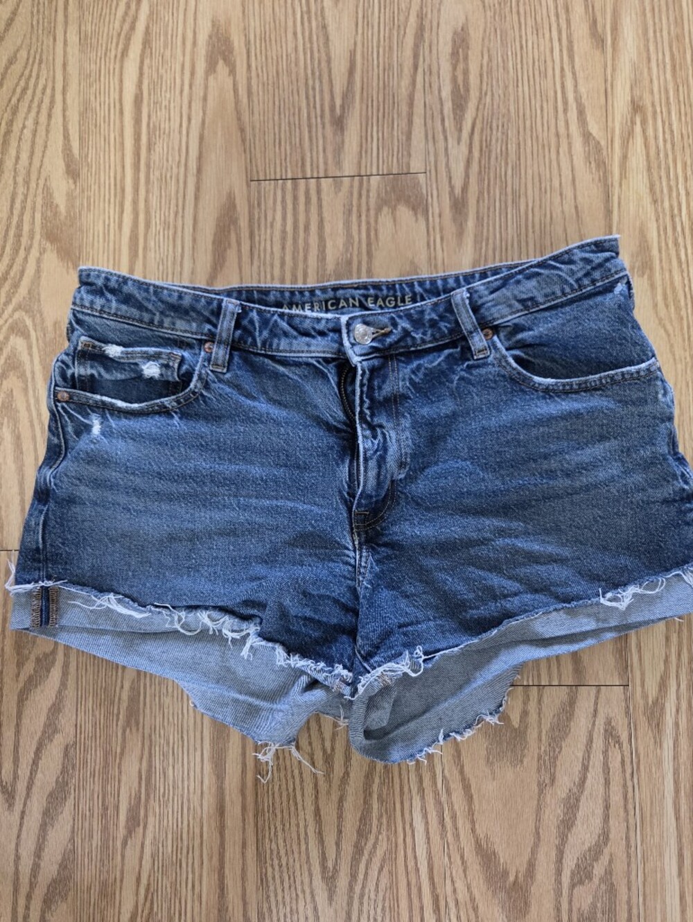American Eagle dark blue distressed denim cutoff shorts